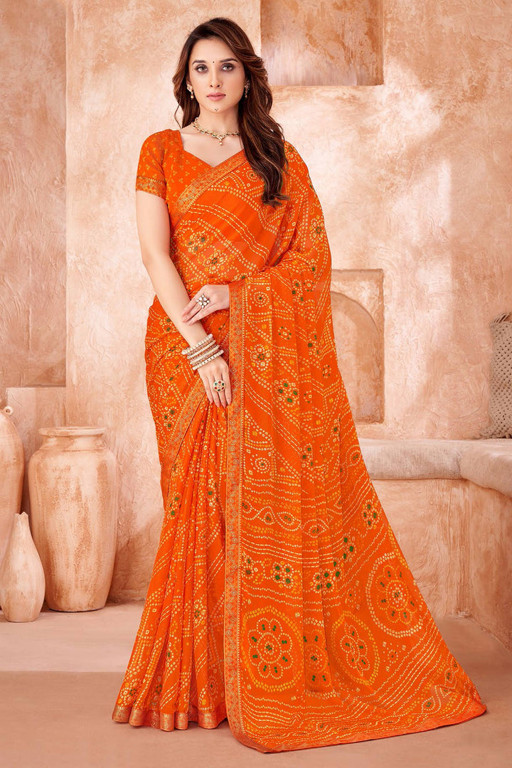 Chiffon Fabric Orange Color Bandhani Printed Saree