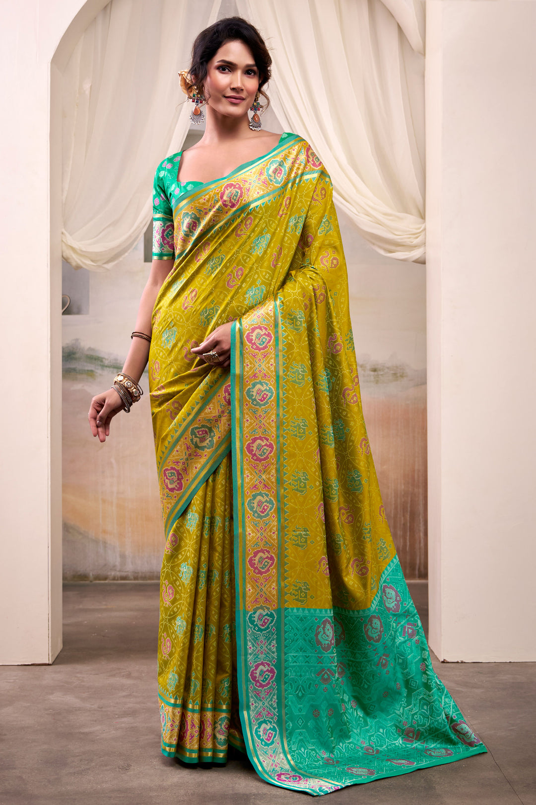Fabulous Festive Look Mehendi Green Color Patola Printed Silk Saree