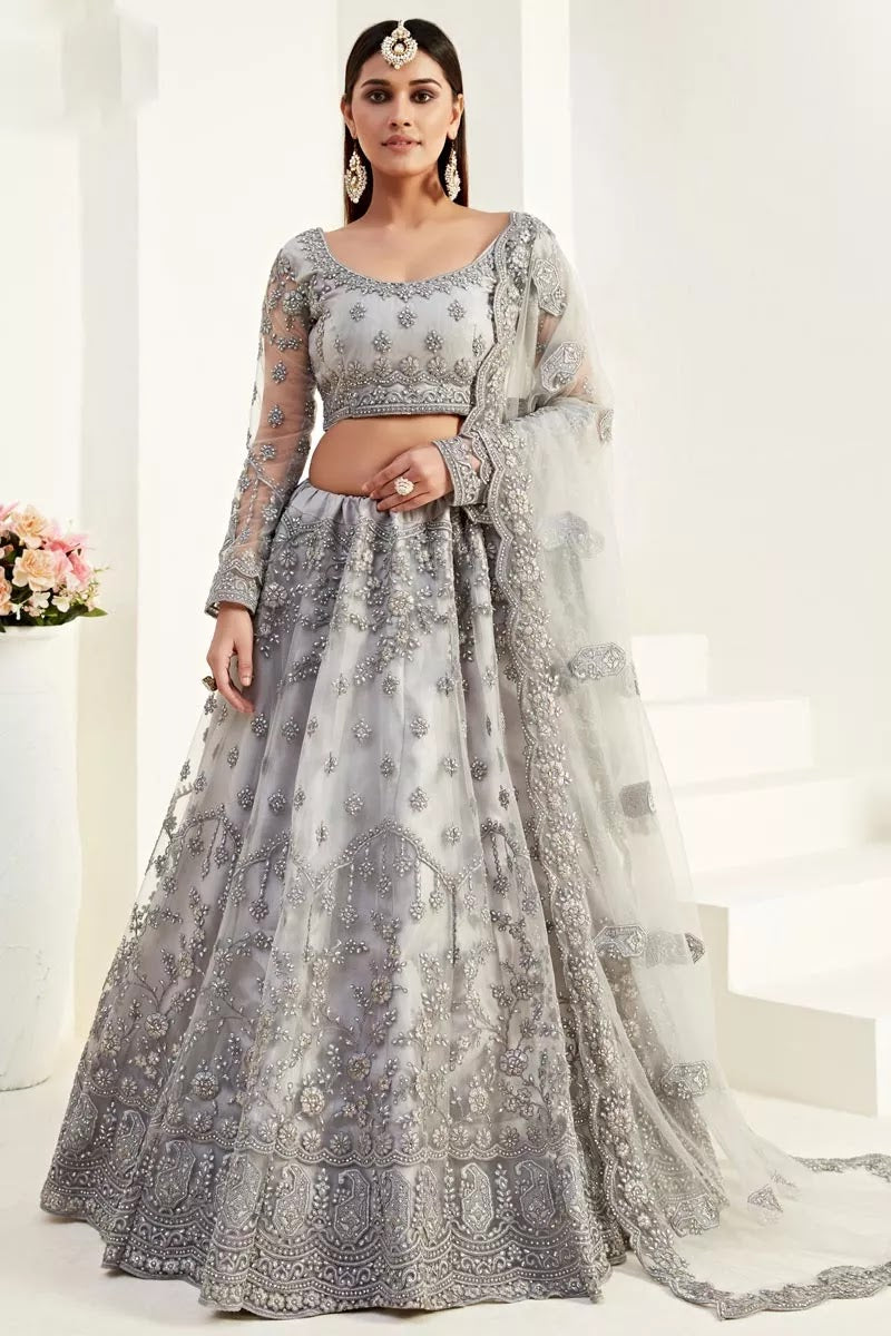 Function Wear Net Fabric Thread Embroidered Grey Color Lehenga