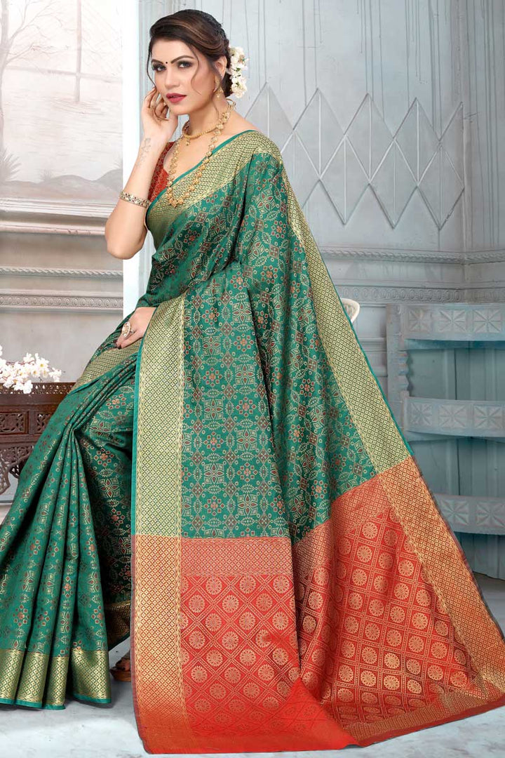 Incredible Festival Wear Patola Silk Fabric Dark Green Color Saree