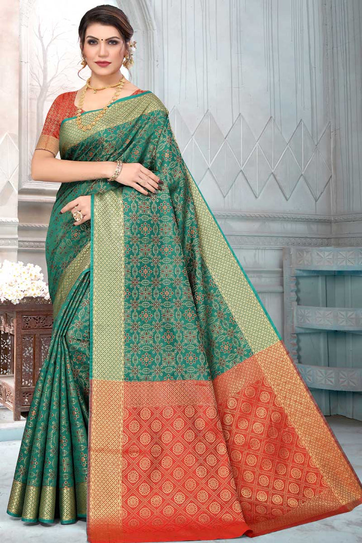 Incredible Festival Wear Patola Silk Fabric Dark Green Color Saree