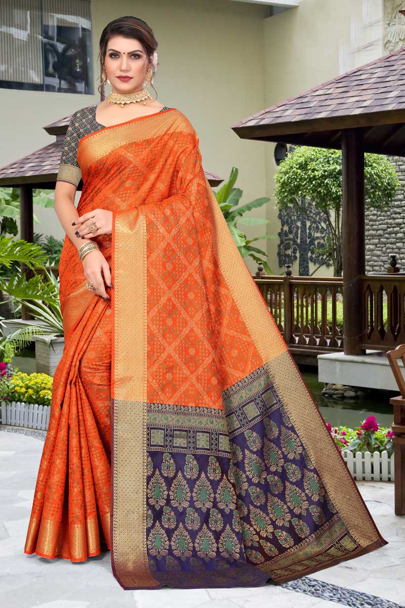 Patola Silk Fabric Rust Color Saree With Remarkable Jacquard Work