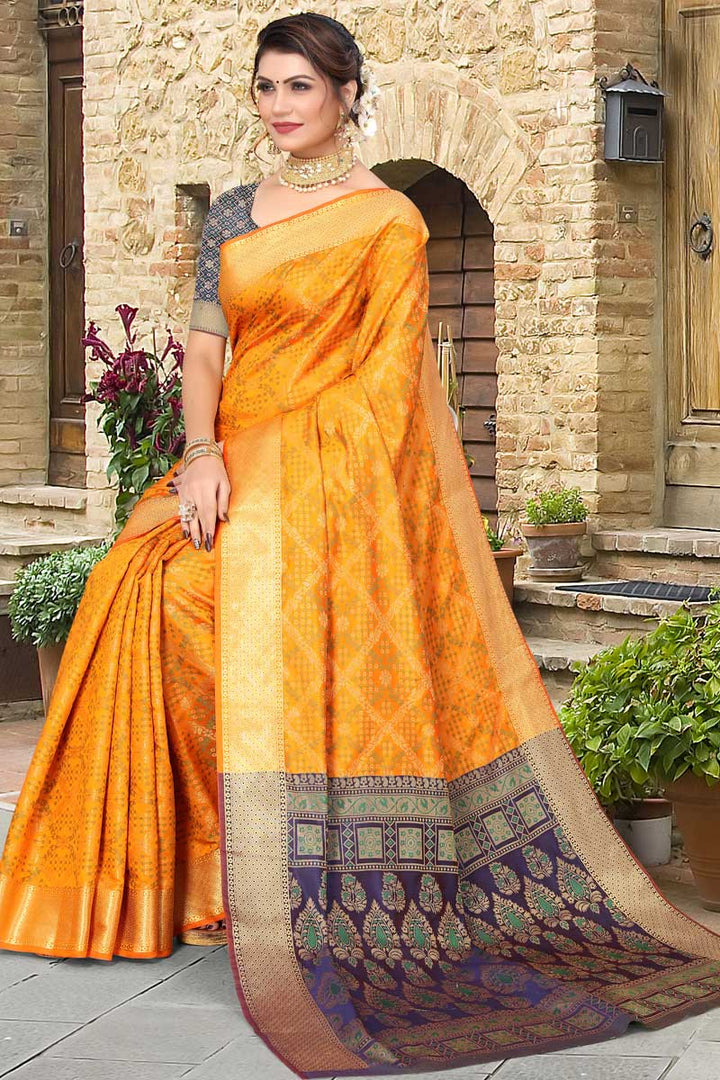 Classic Jacquard Work On Mustard Color Saree In Patola Silk Fabric