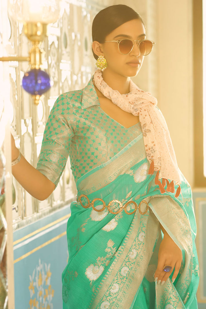 Green Color Mesmeric Weaving Work On Party Look Saree In Linen Fabric