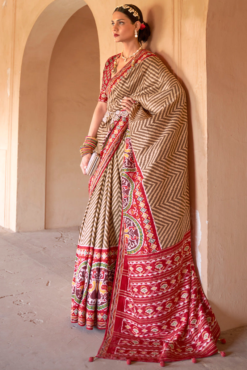 Art Silk Fabric Bewitching Printed Patola Saree In Cream Color