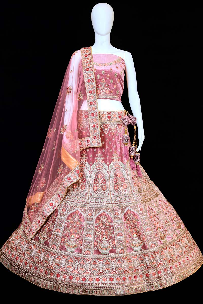 Breathtaking Velvet Fabric Pink Color Wedding Wear Bridal Lehenga With Embroidered Work