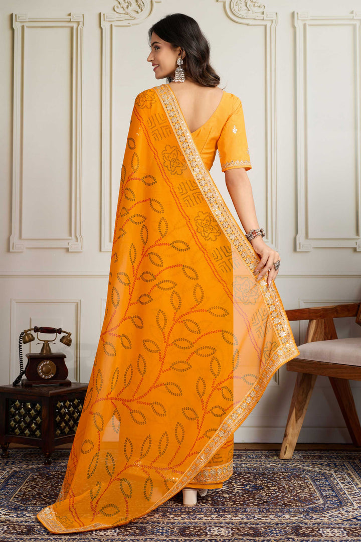 Amazing Yellow Color Georgette Fabric Bandhani Printed Saree