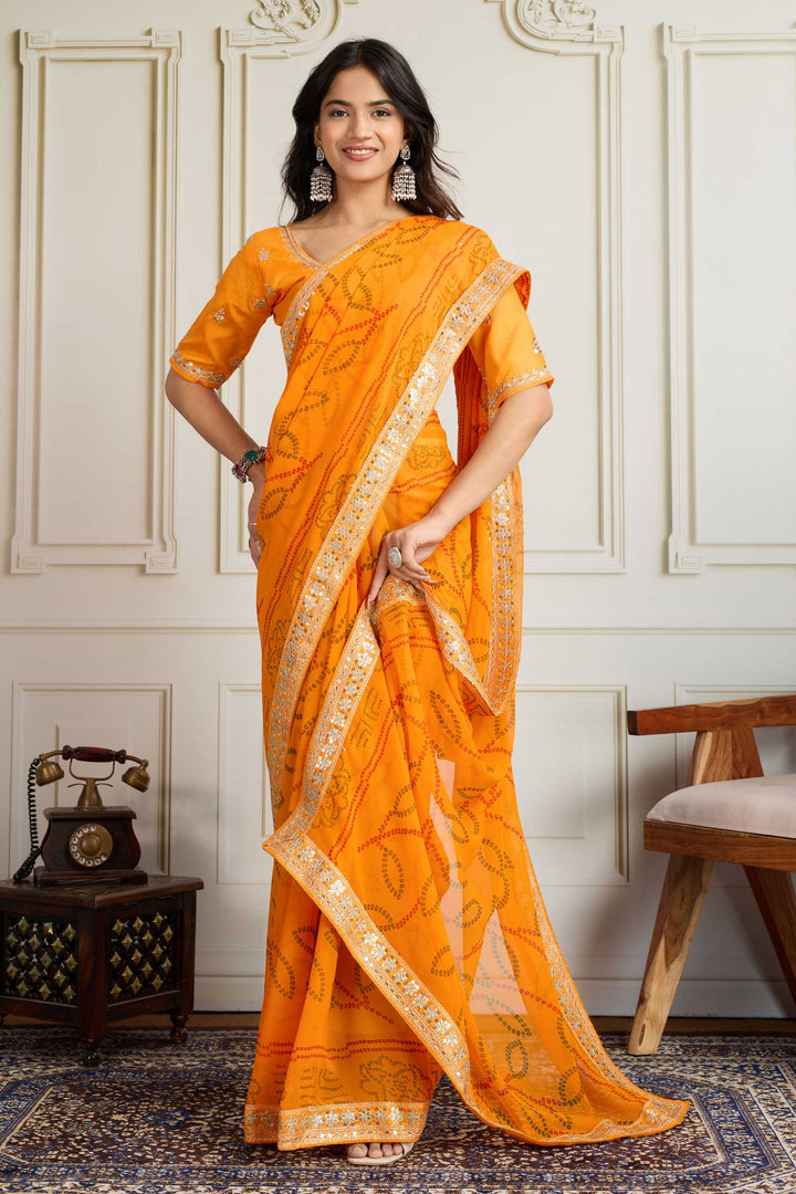 Amazing Yellow Color Georgette Fabric Bandhani Printed Saree