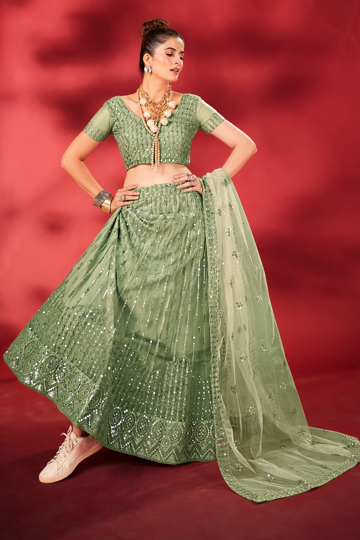 Ingenious Sequins Work Sea Green Color Net Fabric Lehenga