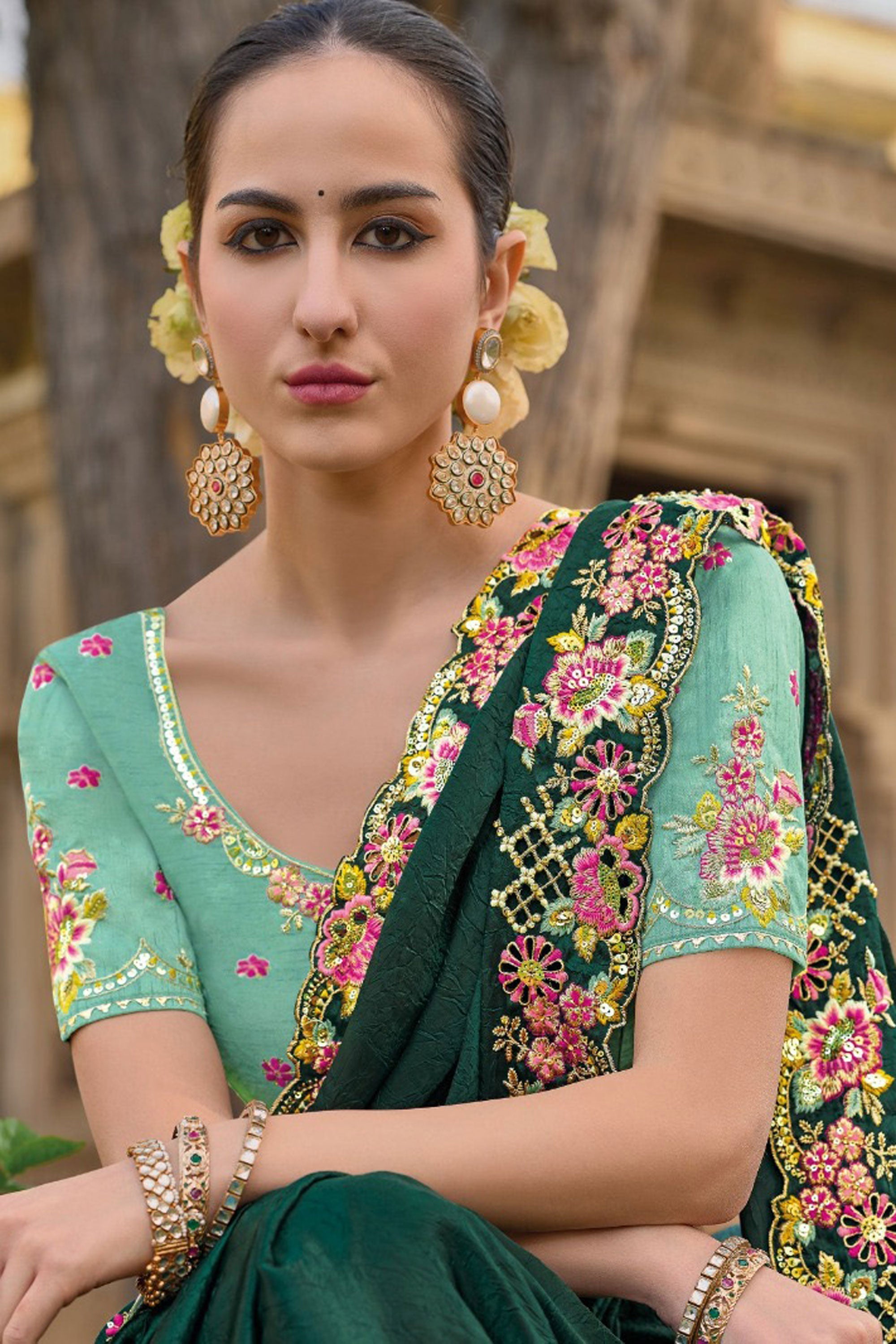 Radiant Border Work On Dark Green Color Organza Silk Fabric Saree