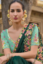 Load image into Gallery viewer, Radiant Border Work On Dark Green Color Organza Silk Fabric Saree
