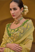 Load image into Gallery viewer, Beguiling Border Work On Green Color Organza Silk Fabric Saree
