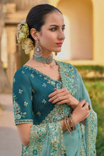 Load image into Gallery viewer, Tempting Organza Silk Fabric Light Cyan Color Saree With Border Work
