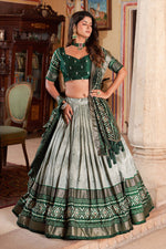 Load image into Gallery viewer, Exclusive Foil Printed Work On Green Color Lehenga In Art Silk Fabric
