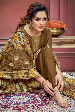 Marvellous Printed Work On Muslin Fabric Salwar Suit In Chikoo Color