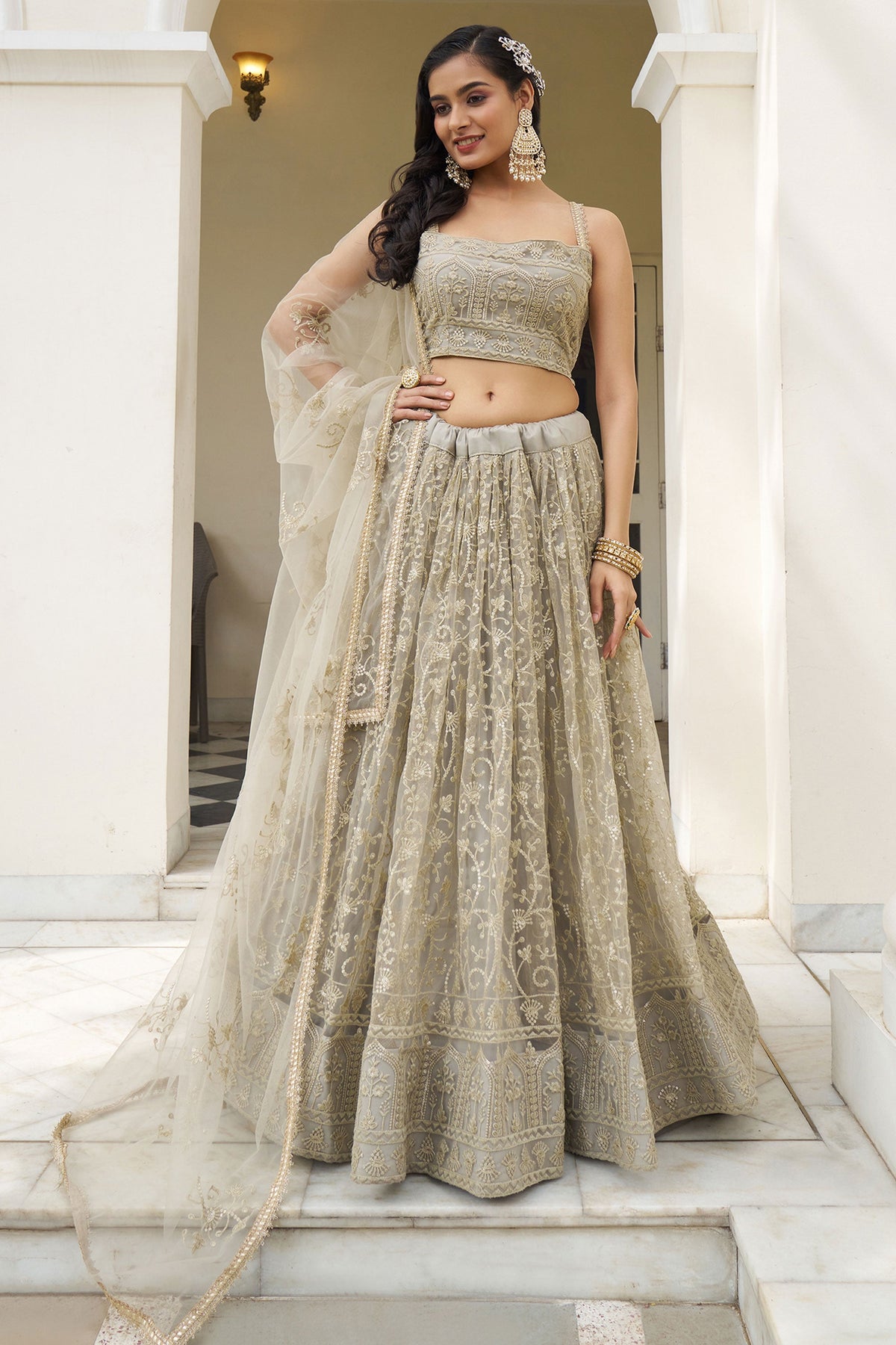 Trendy Net Fabric Beige Color Lehenga With Sequins Work