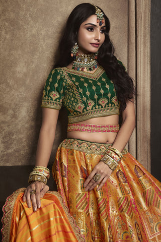 Excellent Silk Fabric Orange Color Bridal Lehenga With Sequins Work