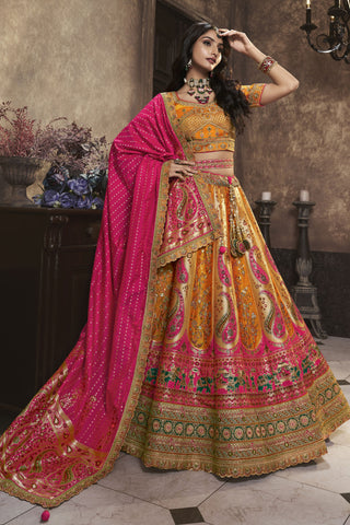 Tempting Silk Fabric Mustard Color Bridal Lehenga With Sequins Work