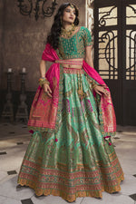 Load image into Gallery viewer, Engaging Sea Green Color Silk Fabric Bridal Lehenga With Sequins Work
