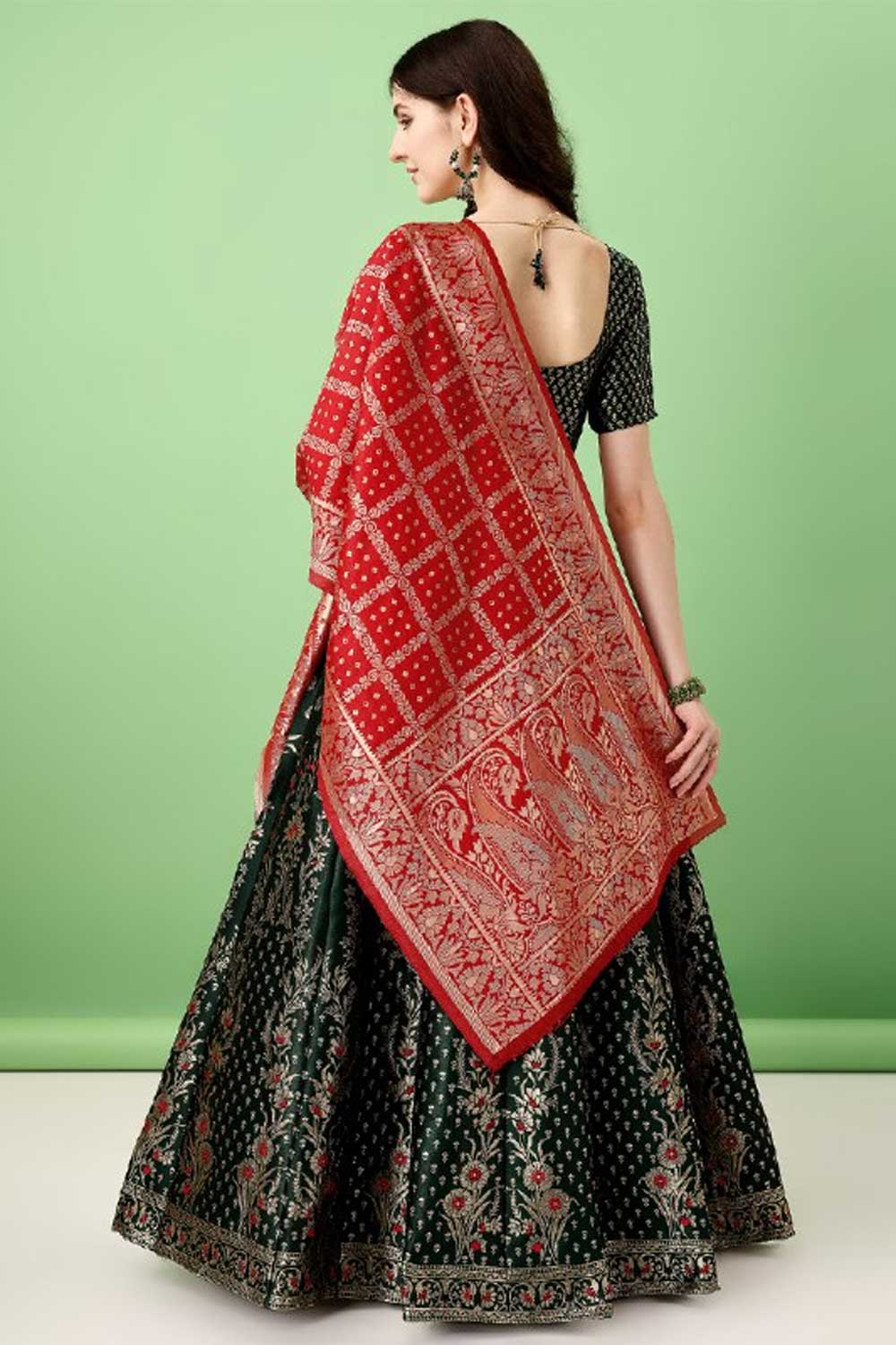 Amazing Jacquard Work On Dark Green Color Art Silk Fabric Lehenga