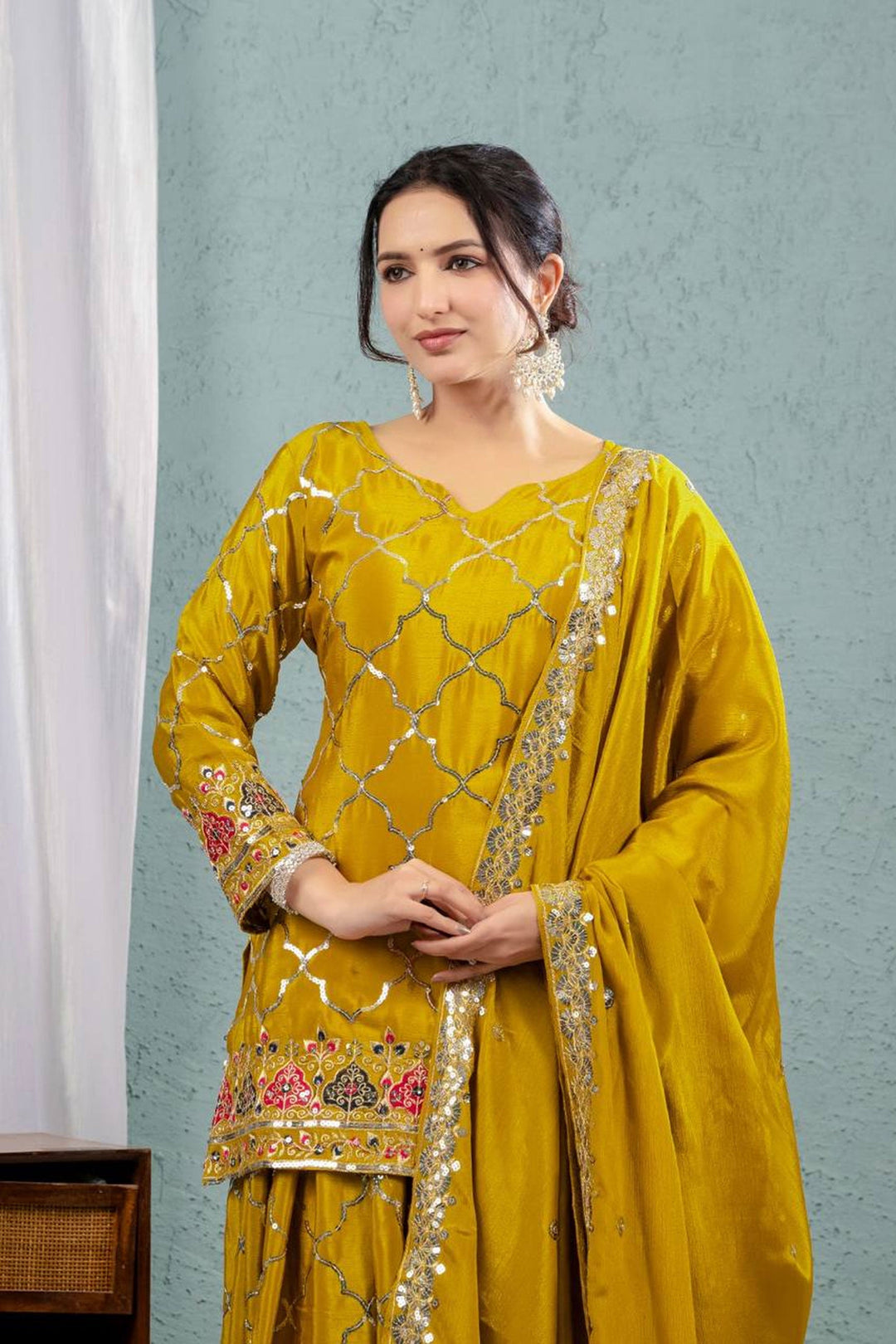 Febulous Chinon Silk Fabric Yellow Color Readymade Sharara Suit