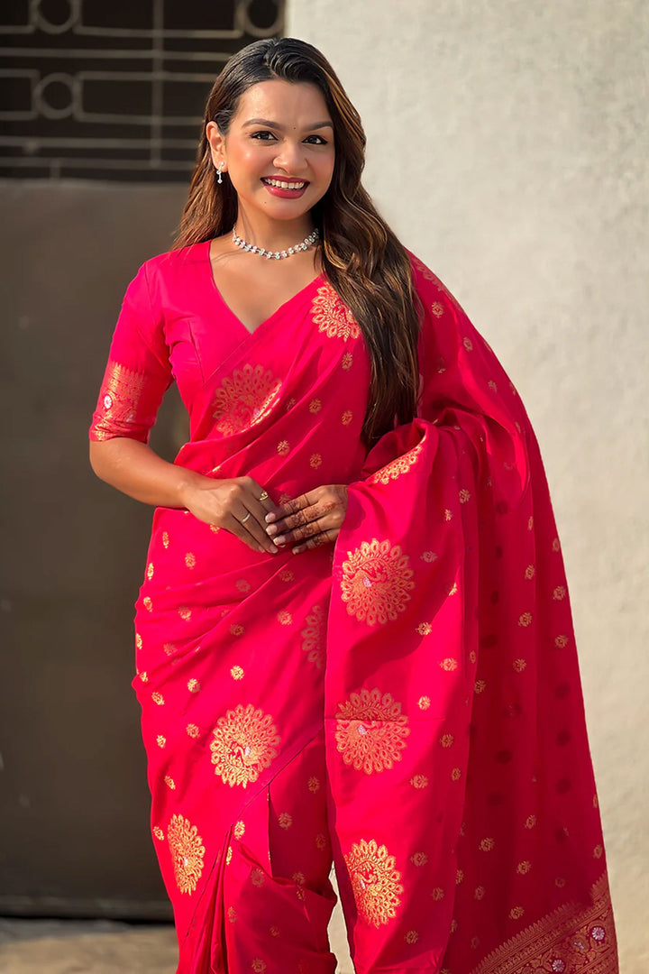 Jacquard Work Imposing Banarsi Style Silk Saree In Rani Color