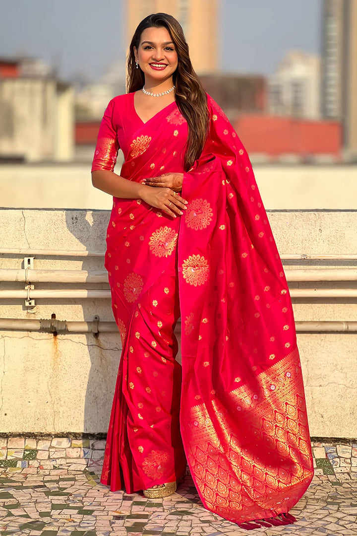 Jacquard Work Imposing Banarsi Style Silk Saree In Rani Color