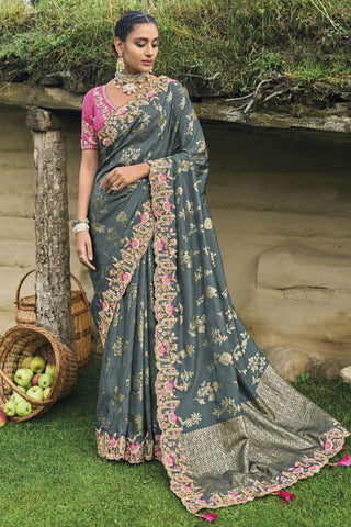 Vaishnavi Andhale Border Work Imposing Wedding Wear Dola Silk Saree In Grey Color