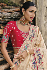 Load image into Gallery viewer, Vaishnavi Andhale Border Work Soothing Wedding Wear Dola Silk Saree In Beige Color
