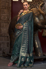 Load image into Gallery viewer, Beguiling Weaving Work On Dark Green Color Satin Silk Fabric Saree
