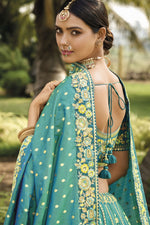 Load image into Gallery viewer, Banarasi Silk Fabric Sea Green Color Pleasance Lehenga With Jacquard Work

