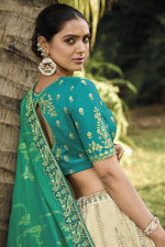 Load image into Gallery viewer, Banarasi Silk Fabric Cream Color Excellent Lehenga With Jacquard Work

