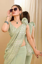 Load image into Gallery viewer, Fabulous Function Wear Sea Green Color Georgette Saree
