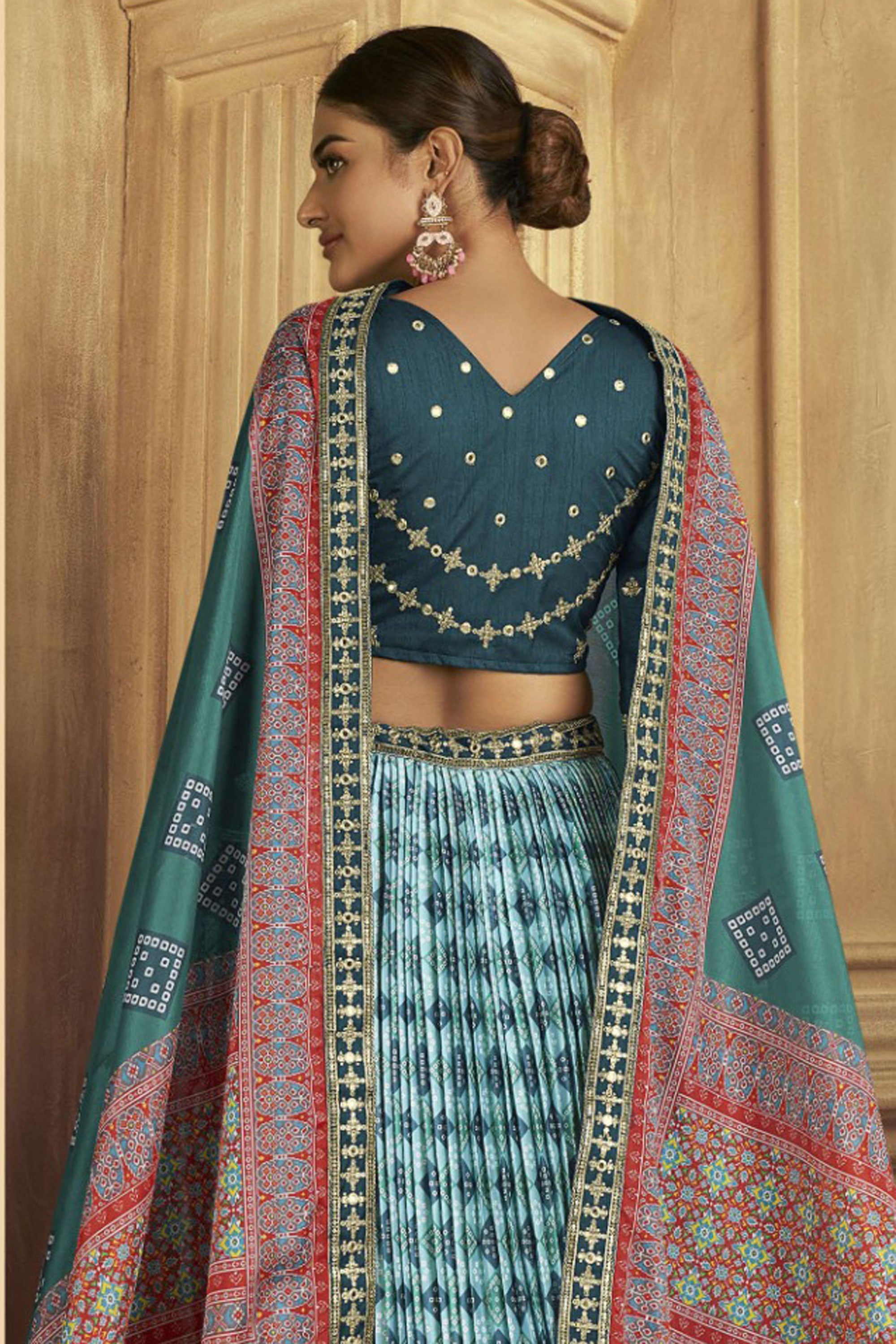 Ingenious Patola Printed Light Cyan Color Gaji Silk Lehenga