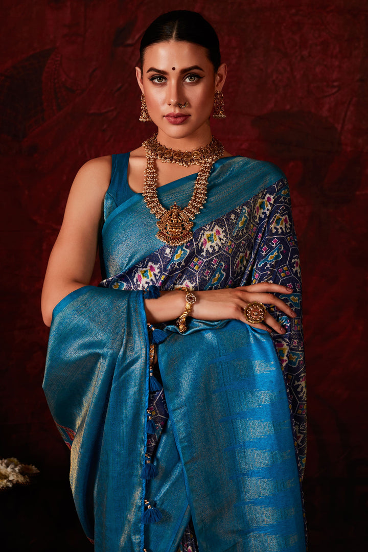 Soothing Patola Style Printed Silk Saree In Navy Blue Color