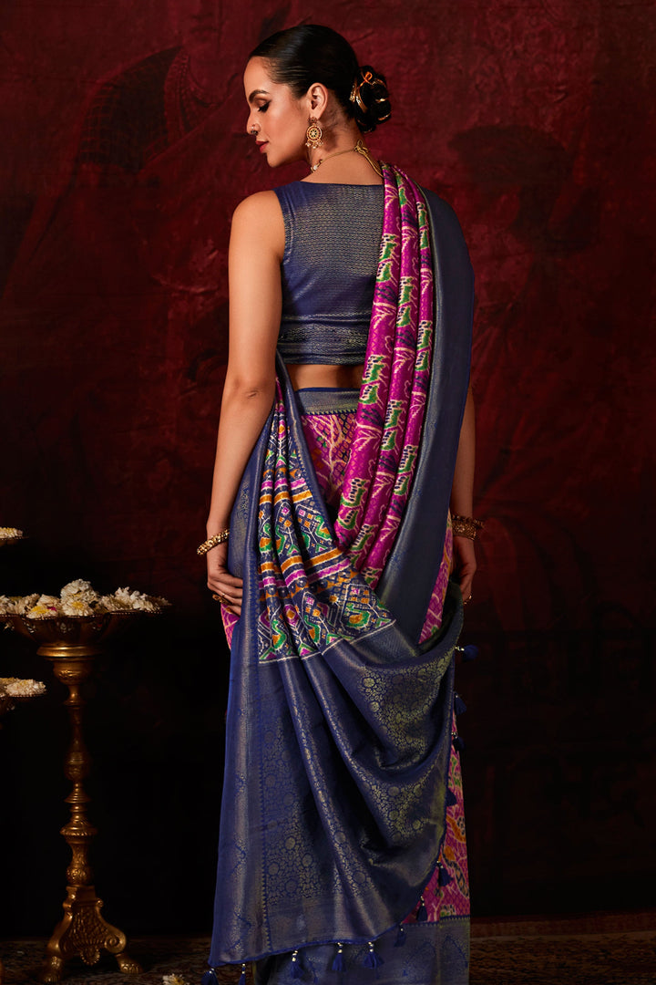 Delicate Rani Color Patola Style Printed Silk Saree