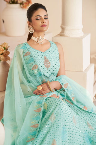 Sea Green Color Net Fabric Enticing Sequins Work Lehenga