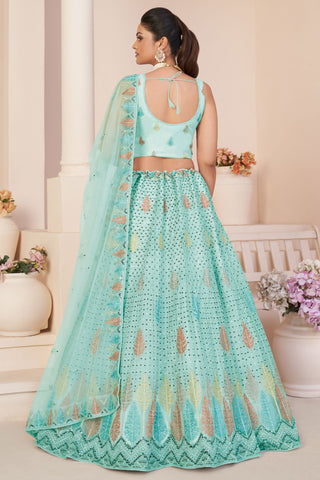 Sea Green Color Net Fabric Enticing Sequins Work Lehenga