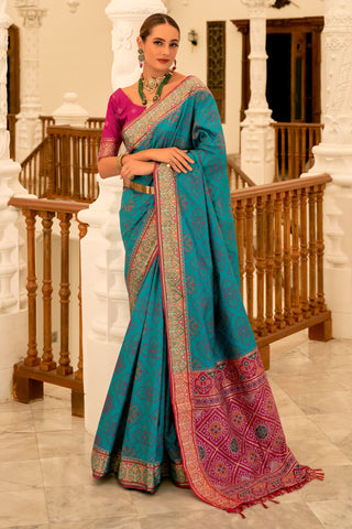 Printed Work Soothing Banarsi Silk Patola Saree In Cyan Color