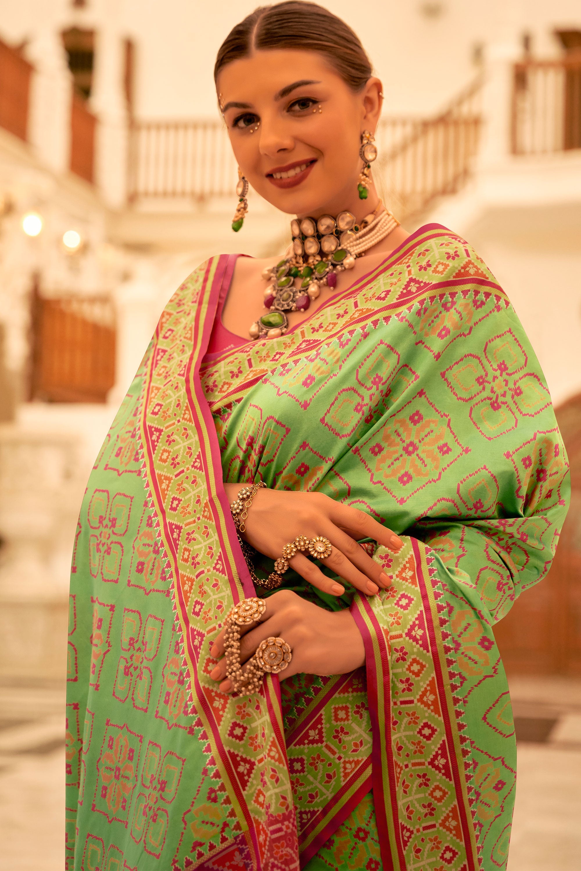 Sea Green Color Glorious Banarsi Silk Patola Saree With Printed Work