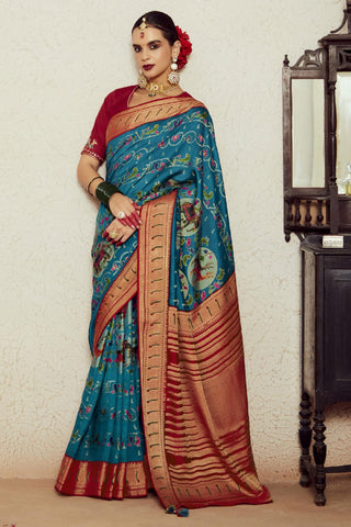 Cyan Color Weaving Work Glamorous Brasso Fabric Saree