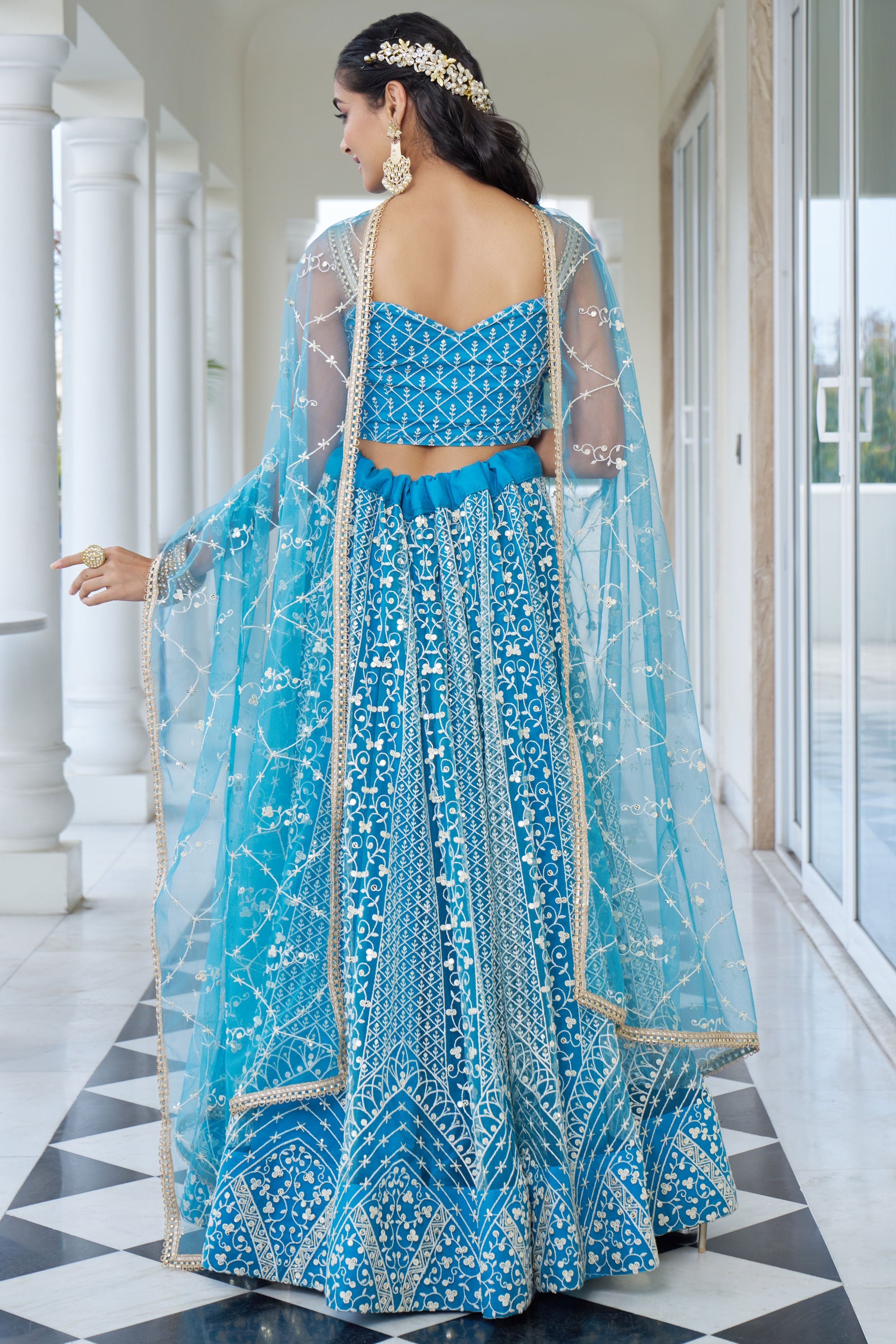 Cyan Color Net Fabric Sequins Embroidered Lehenga For Sangeet