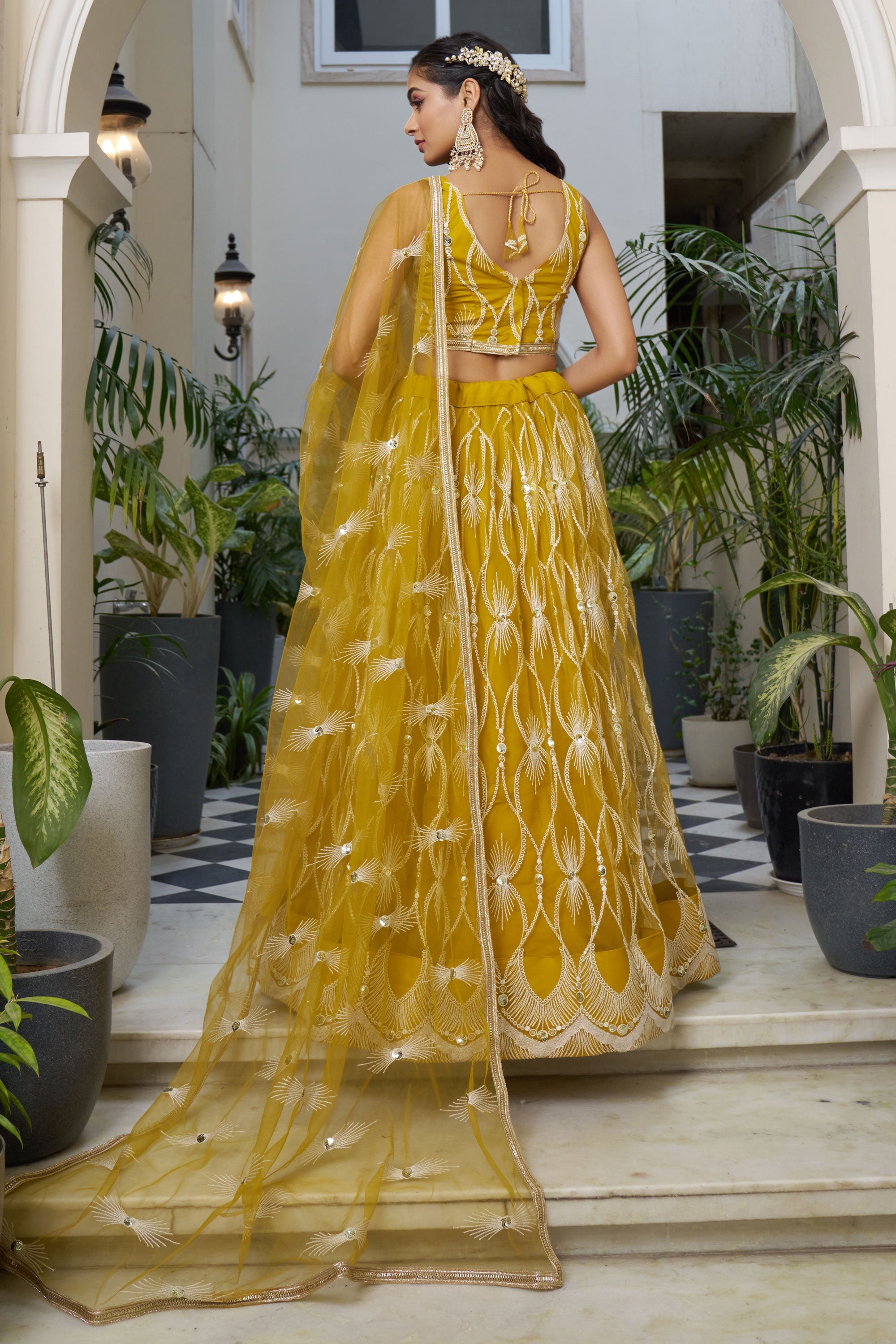 Elegant Mustard Color Net Fabric Sangeet Wear Sequins Embroidered Lehenga