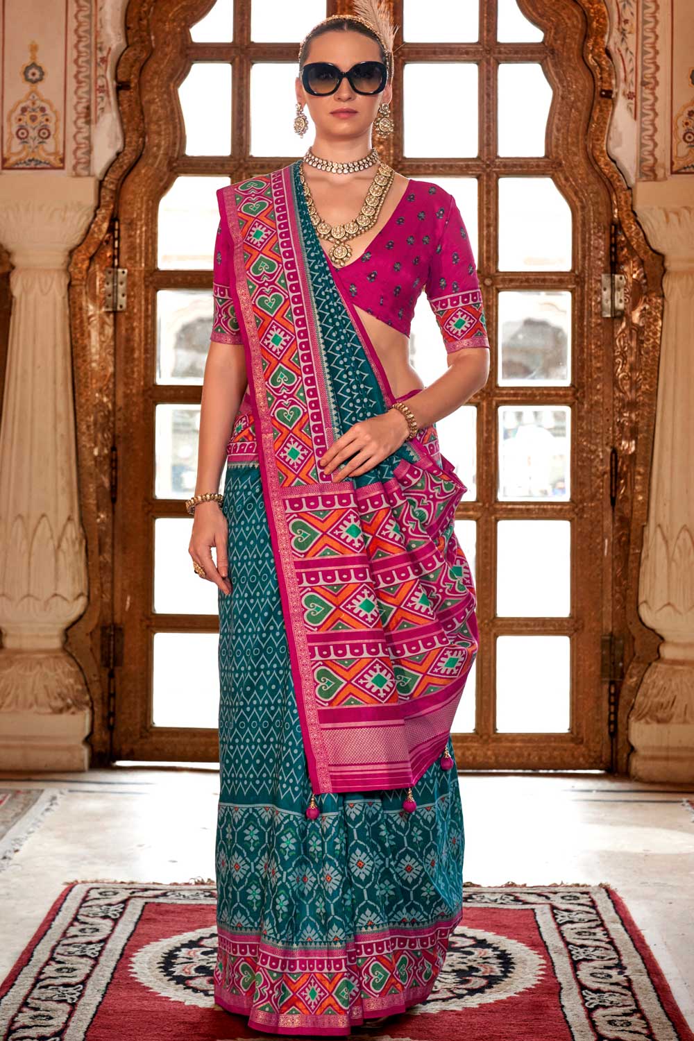 Beguiling Cyan Color Art Silk Patola Printed Saree