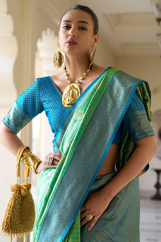 Creative Weaving Work On Banarasi Silk Saree In Sea Green Color