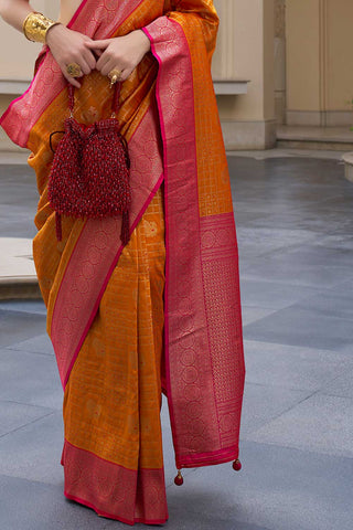 Marvellous Weaving Work On Banarasi Silk Saree In Orange Color