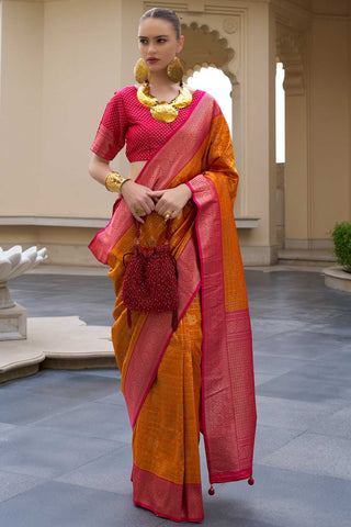 Marvellous Weaving Work On Banarasi Silk Saree In Orange Color