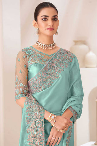 Engaging Sea Green Color Chiffon Fabric Saree With Border Work