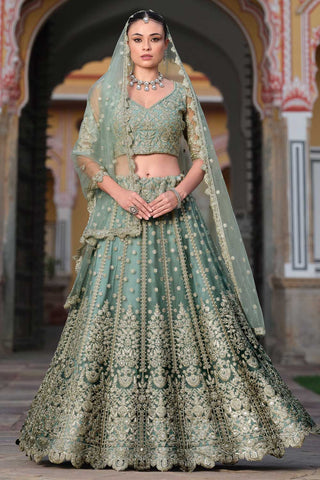 Embroidered Net Fabric Ravishing Lehenga In Sea Green Color