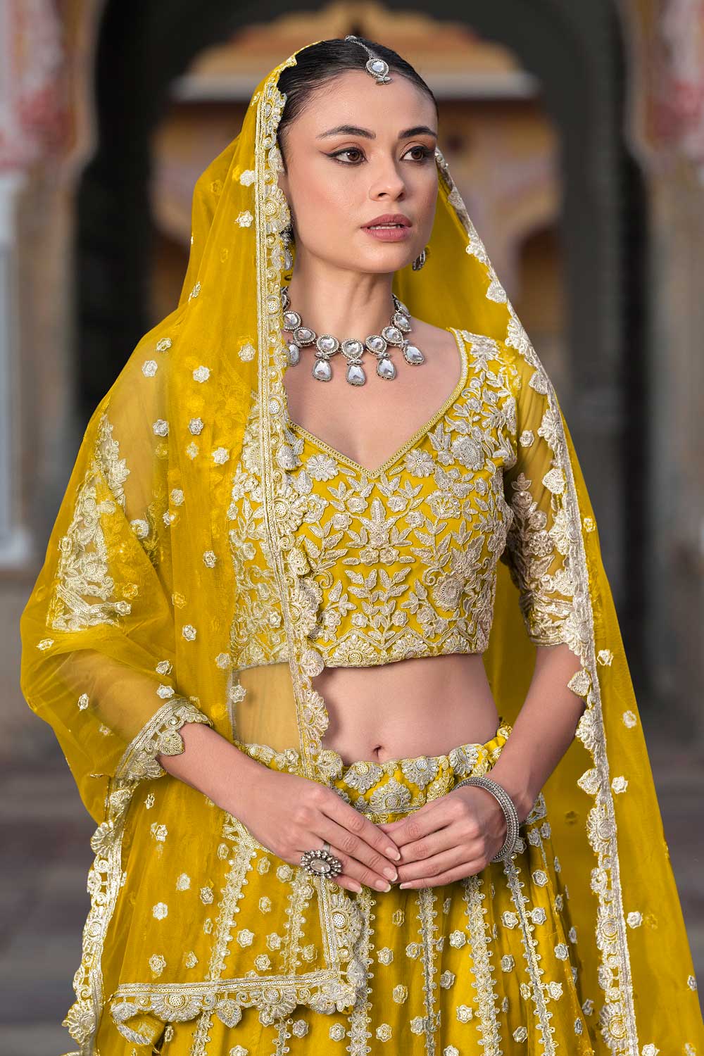 Radiant Net Fabric Yellow Color Embroidered Lehenga